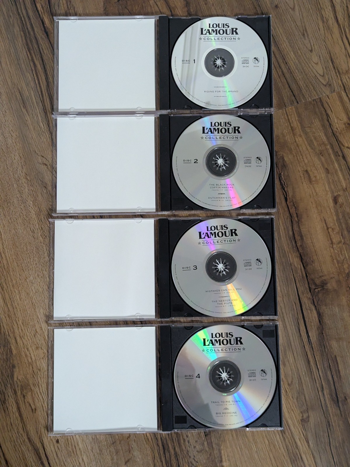 Louis L’Amour audio books featuring Willie Nelson — 7 stories on 4 CDs, wood box