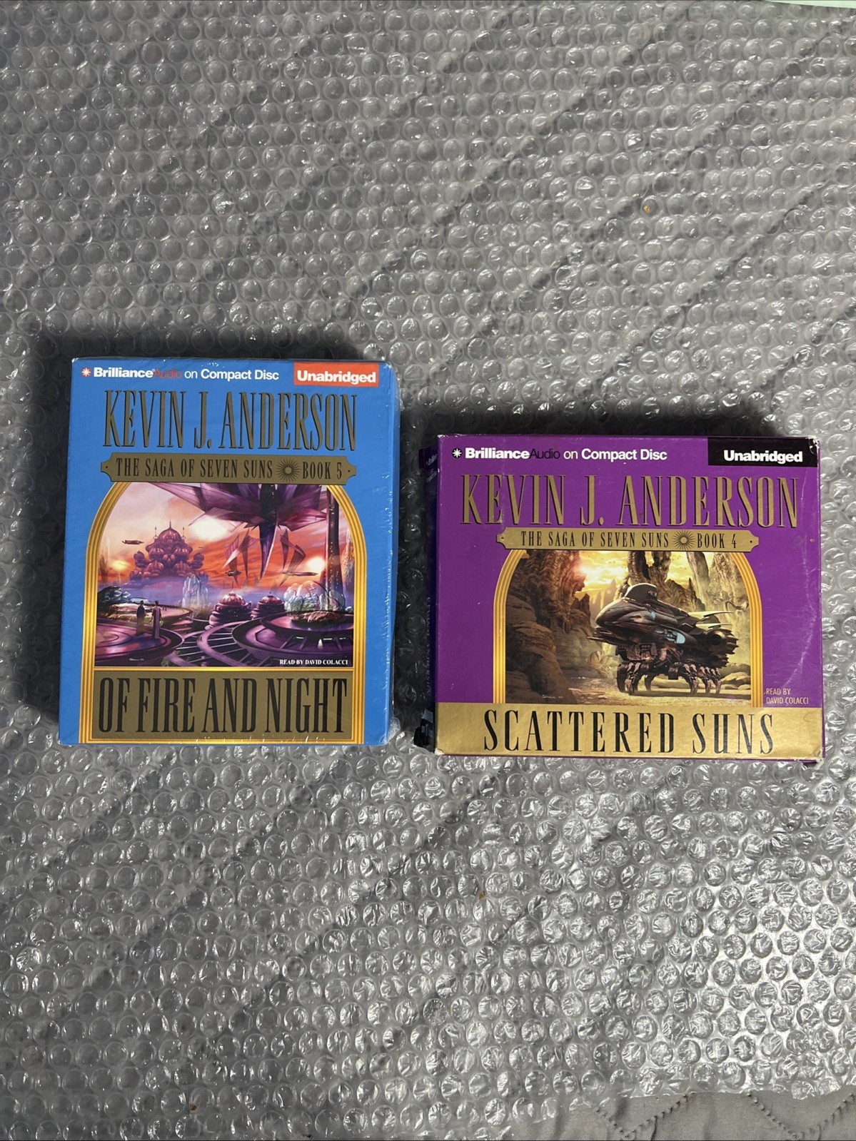 “Of Fire And Night” and “Scattered Suns” By Kevin J Anderson — Audio CD Format