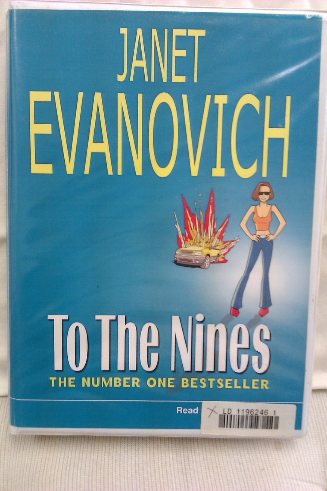To the Nines by Janet Evanovitch: Unabridged Cassette Audiobook (M5)