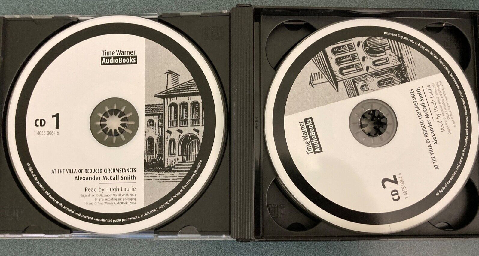 “At the Villa of Reduced Circumstances” by Alexander McCall Smith. Audiobook CDs