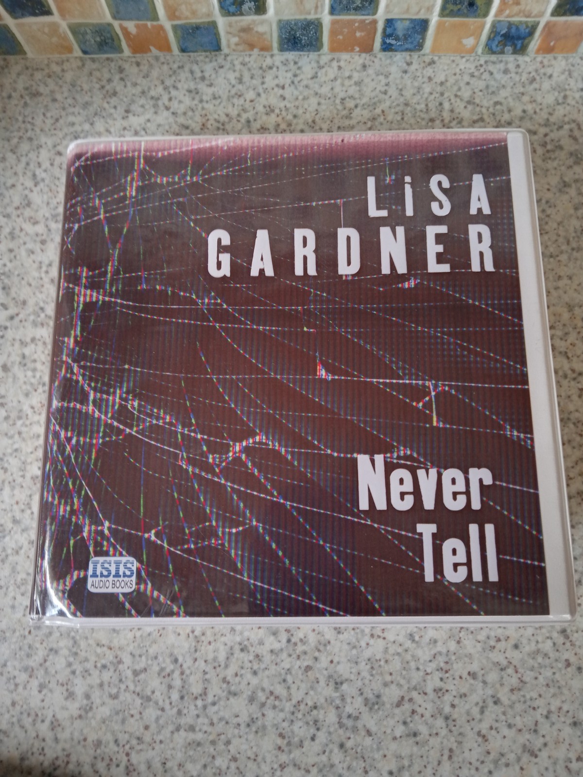 lisa gardner never tell audio book cd ISIS 11 cds 2019 regina reagan unabridged