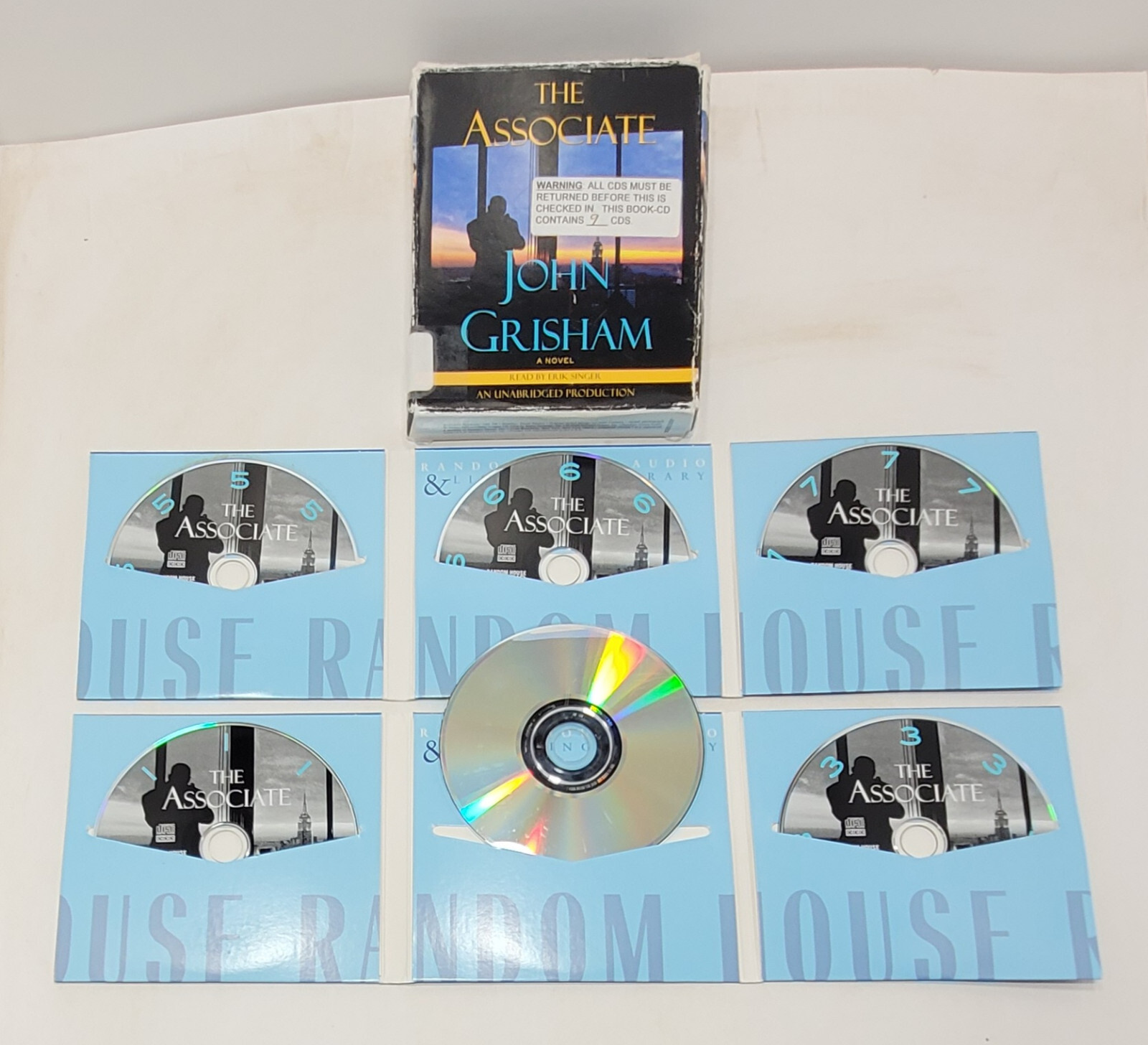 «The Associate» 9 disc audiobook written by John Grisham, read by Erik Singer