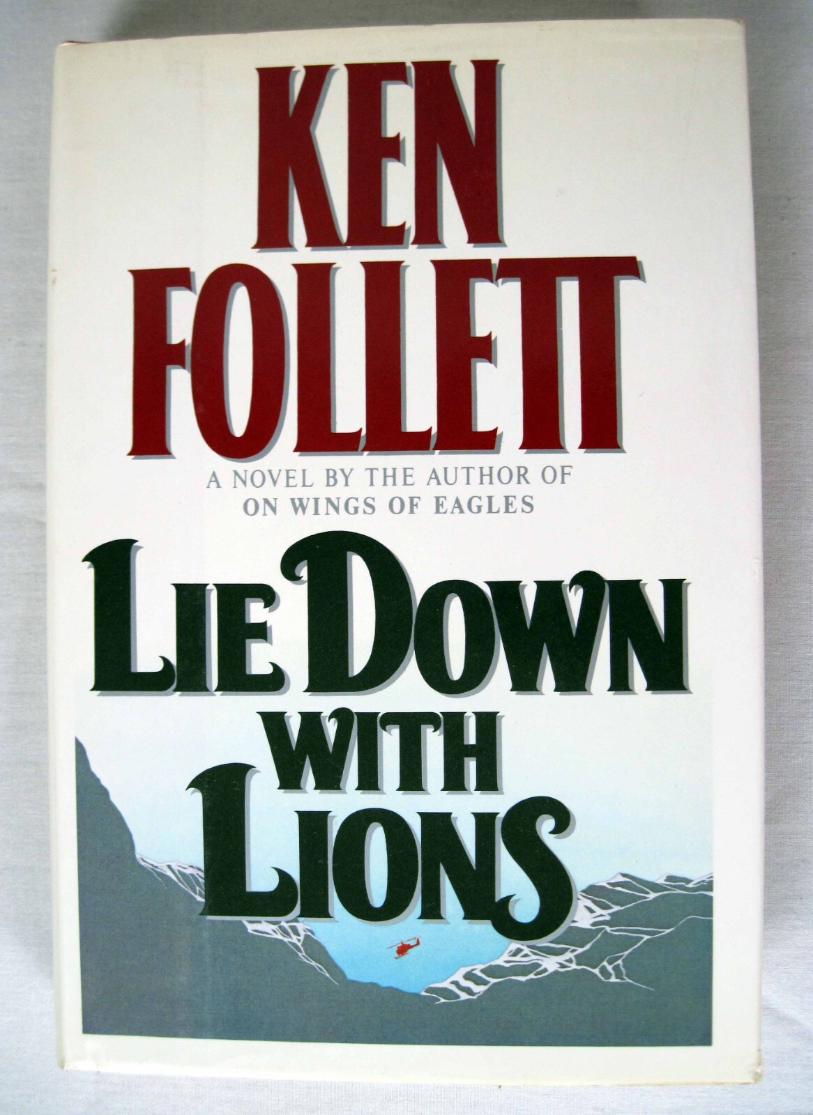 Ken Follett — LIE DOWN WITH LIONS — 1ST Edition 1986 — Hardcover, Dust Jacket