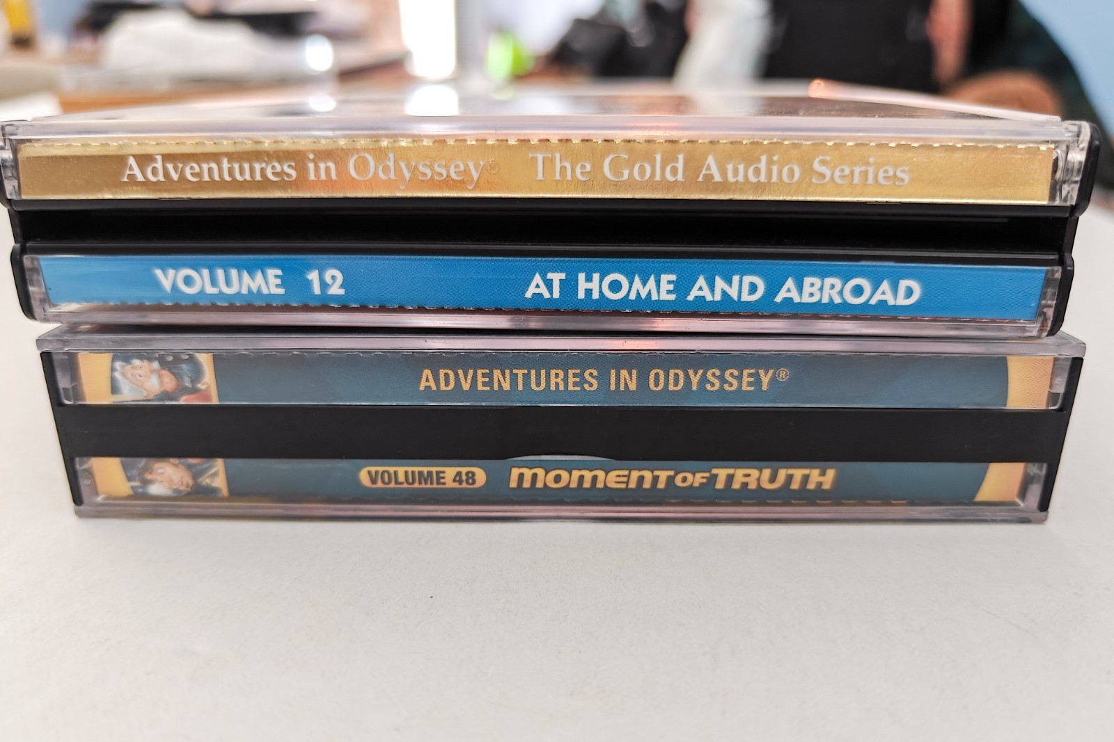 Adventures in Odyssey 2 audio CDs: At Home and Abroad (12), Moment of Truth (48)