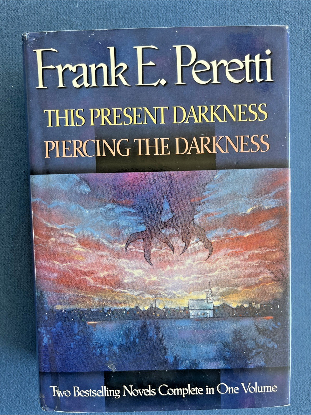 This Present Darkness and Piercing the Darkness 2 Novels 1 Vol By: Frank Peretti