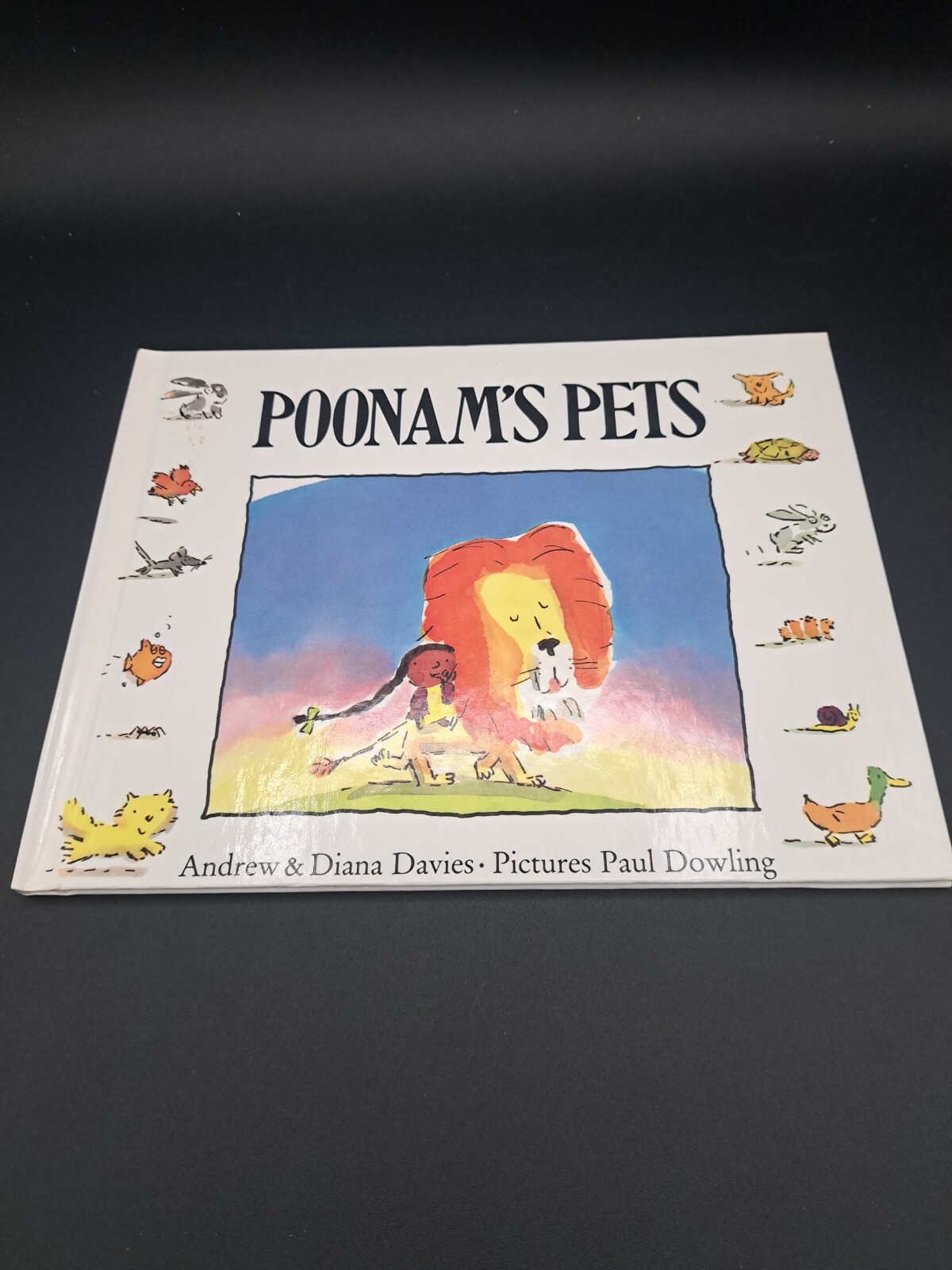 Hard cover Poonams Pets by: Andrew & Diana Davies. Pics by: Paul dowling