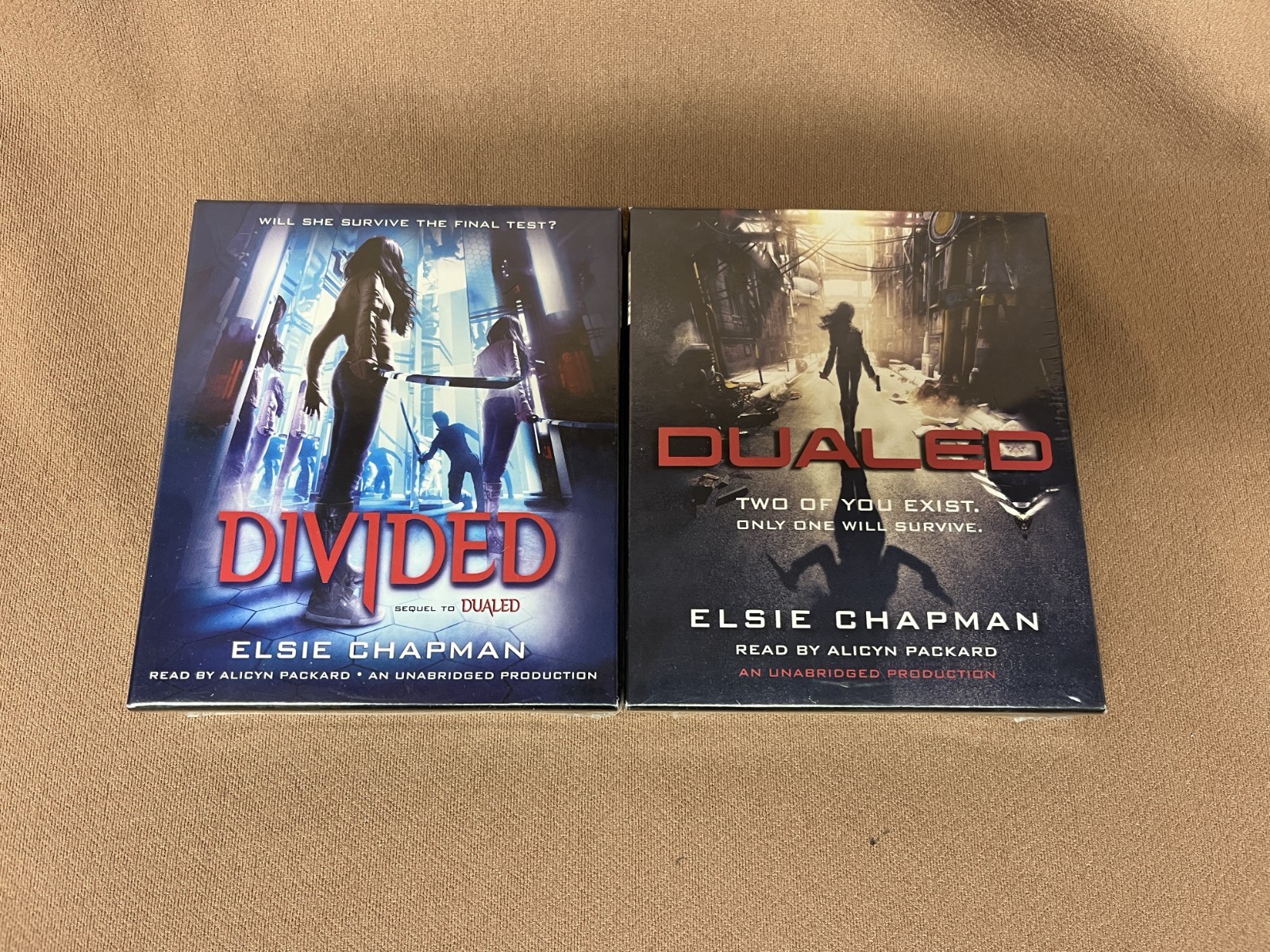 Divided & Dualed — 2 Audio Books — 17 discs — New Factory Sealed