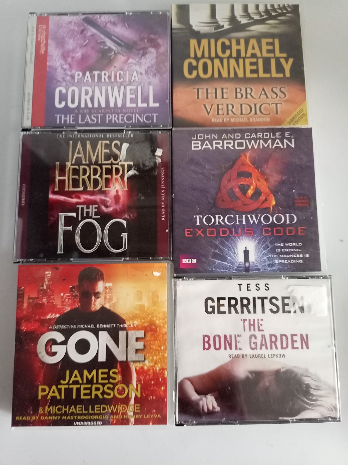 A collection of 6 cd audiobooks by famous crime and mystery writers, 30 cds