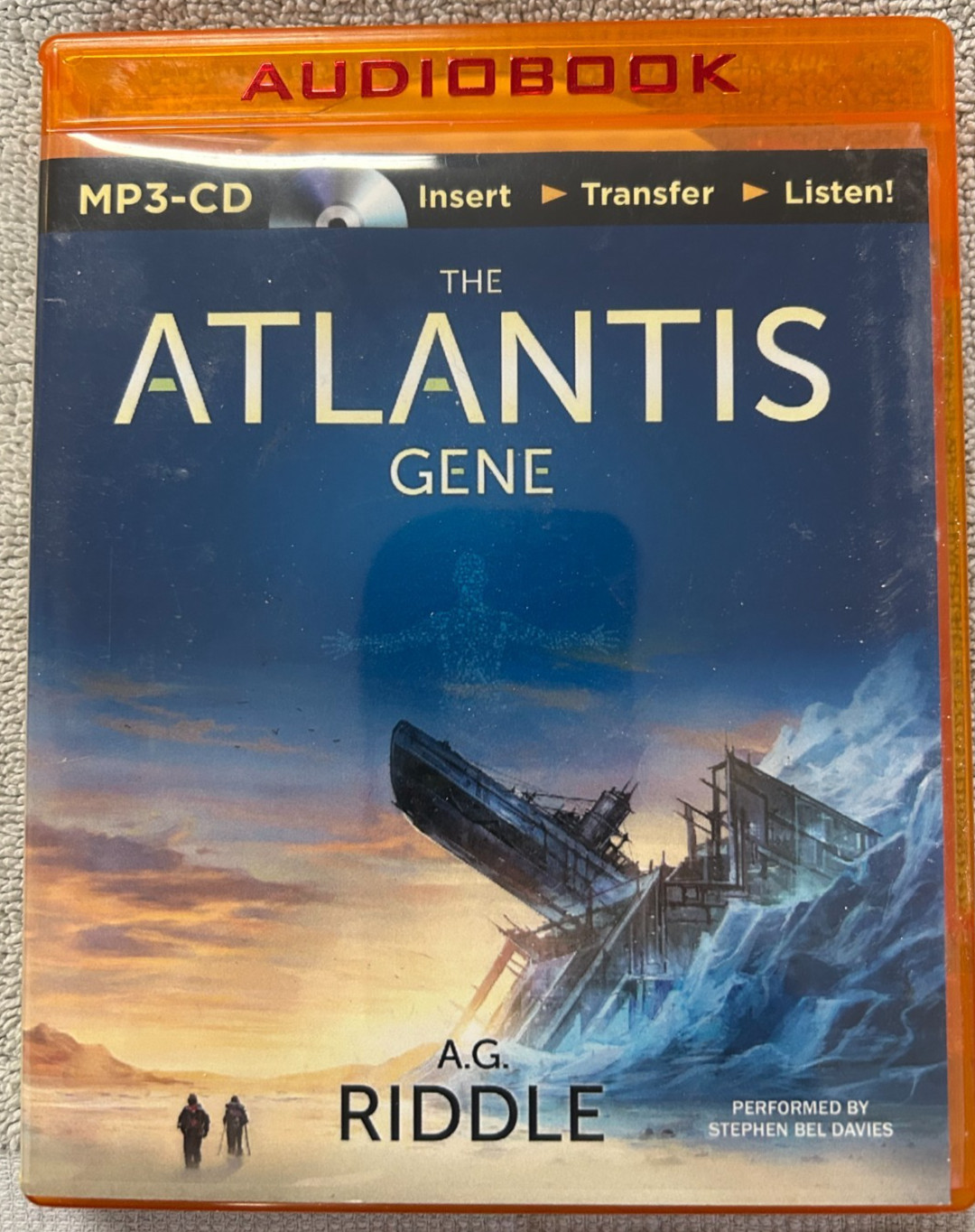 A G Riddle «The Atlantis Gene» CD: Brilliance MP3 Audiobook. One Day Handling