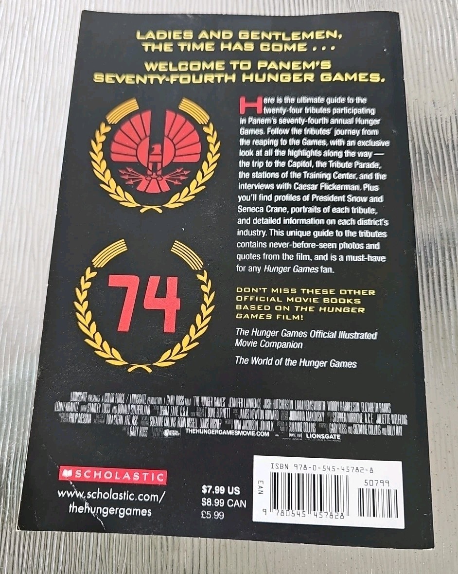 THE HUNGER GAMES TRIBUTE GUIDE Scholastic Illustrated Paperback 1st Edition 2012