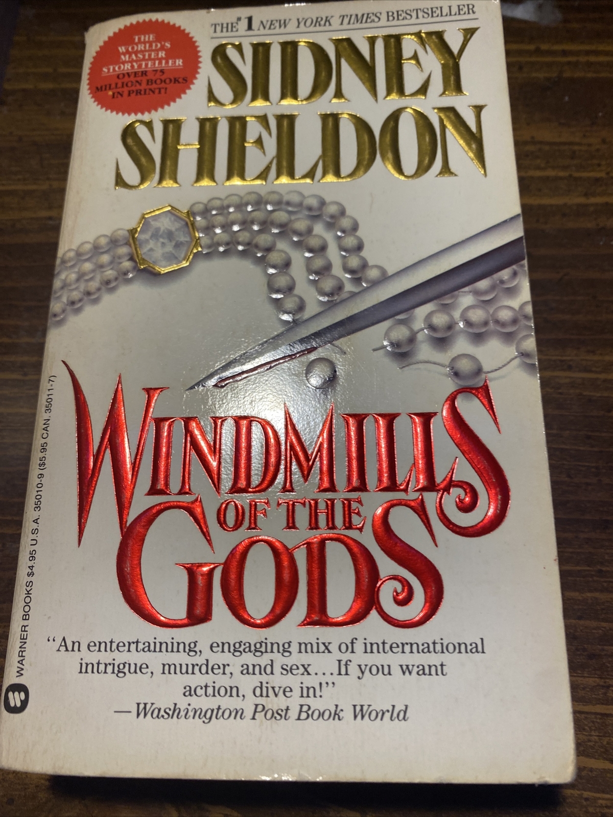 Windmills of the Gods by Sidney Sheldon. Paperback