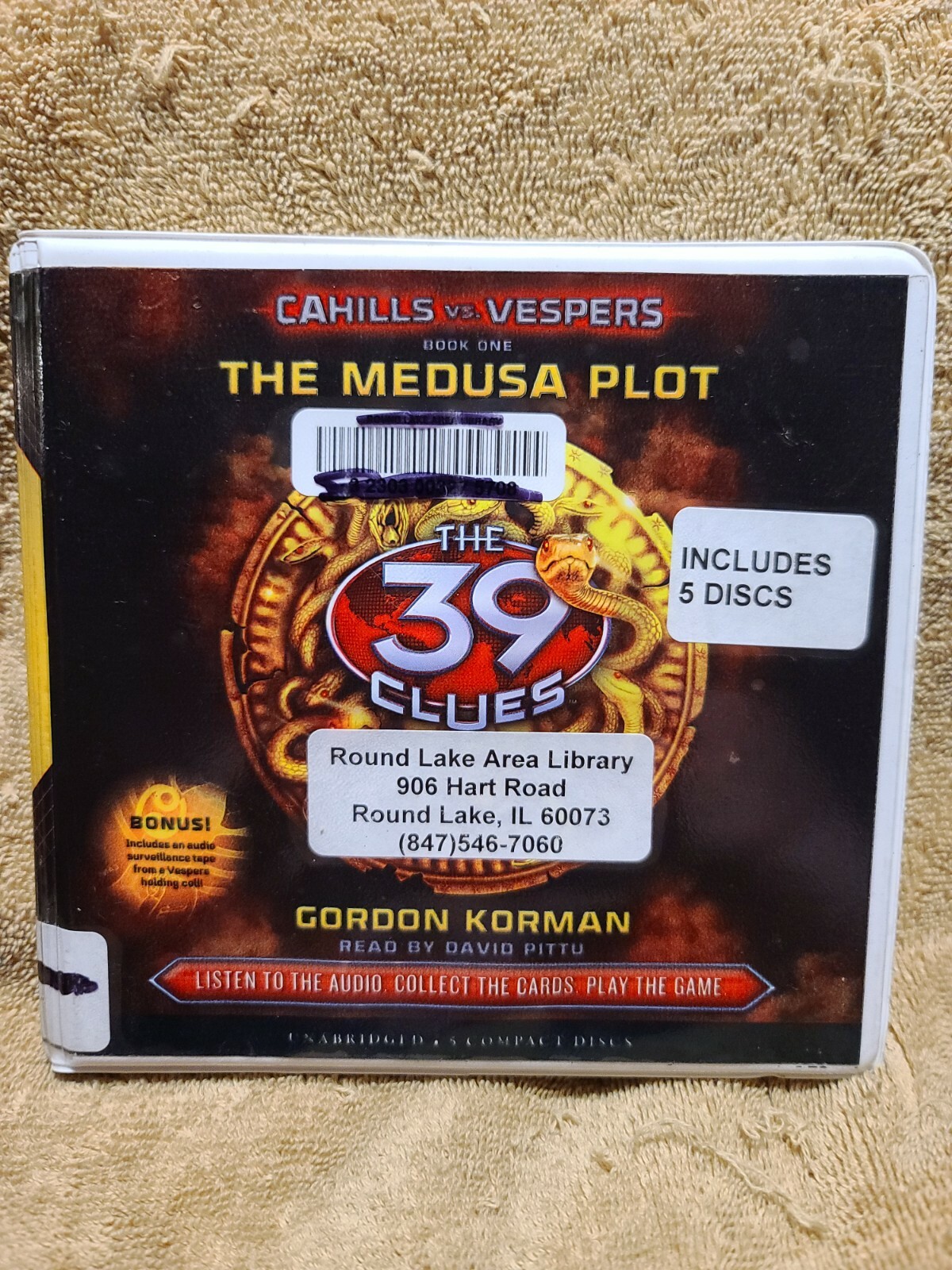Shelf62N Audiobook~The Medusa plot- Gordon korman- unabridged- 5 discs
