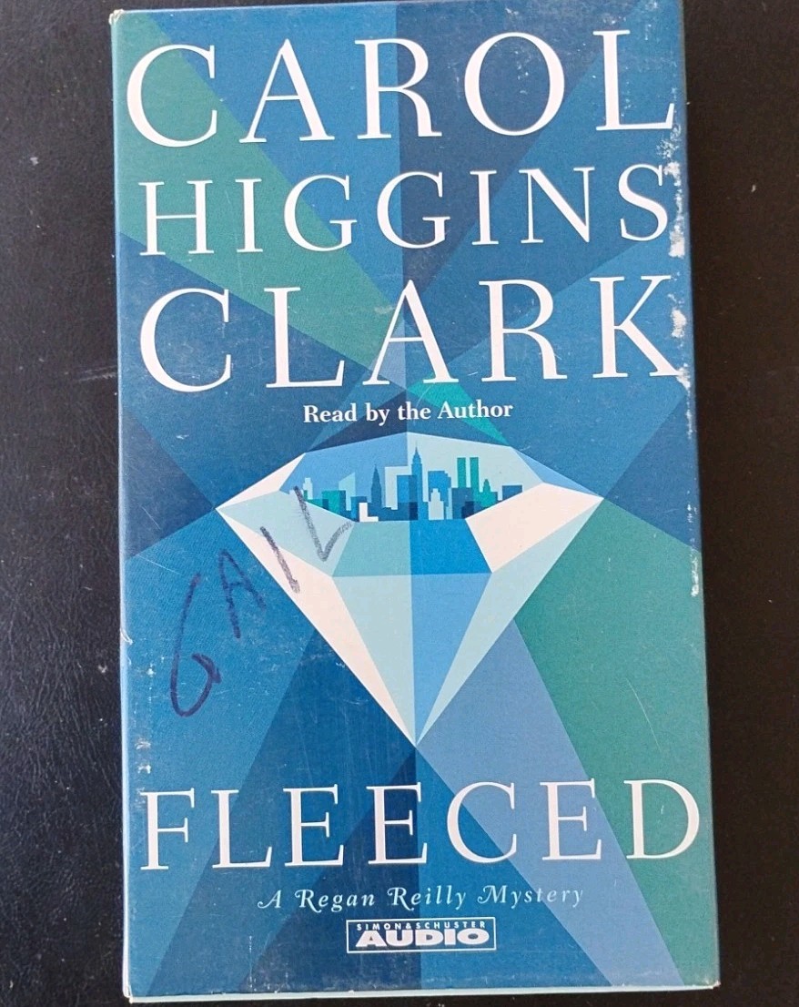 FLEECED A Regan Reilly Mystery Carol Higgins ClarkAudiobook On 3 Cassettes