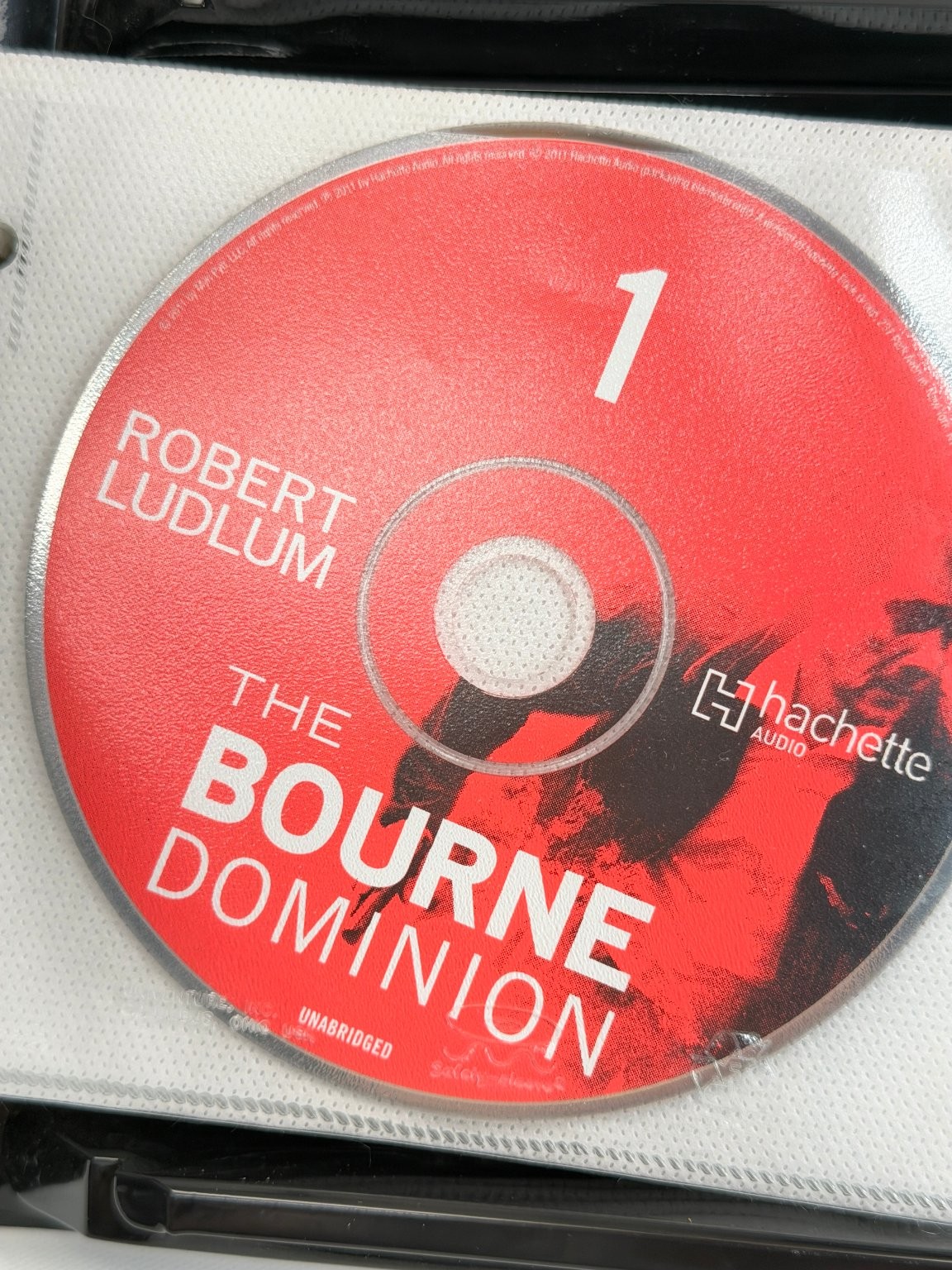 Robert Ludlum’s The Bourne Dominion by Eric Van Lustbader Audiobook CDs