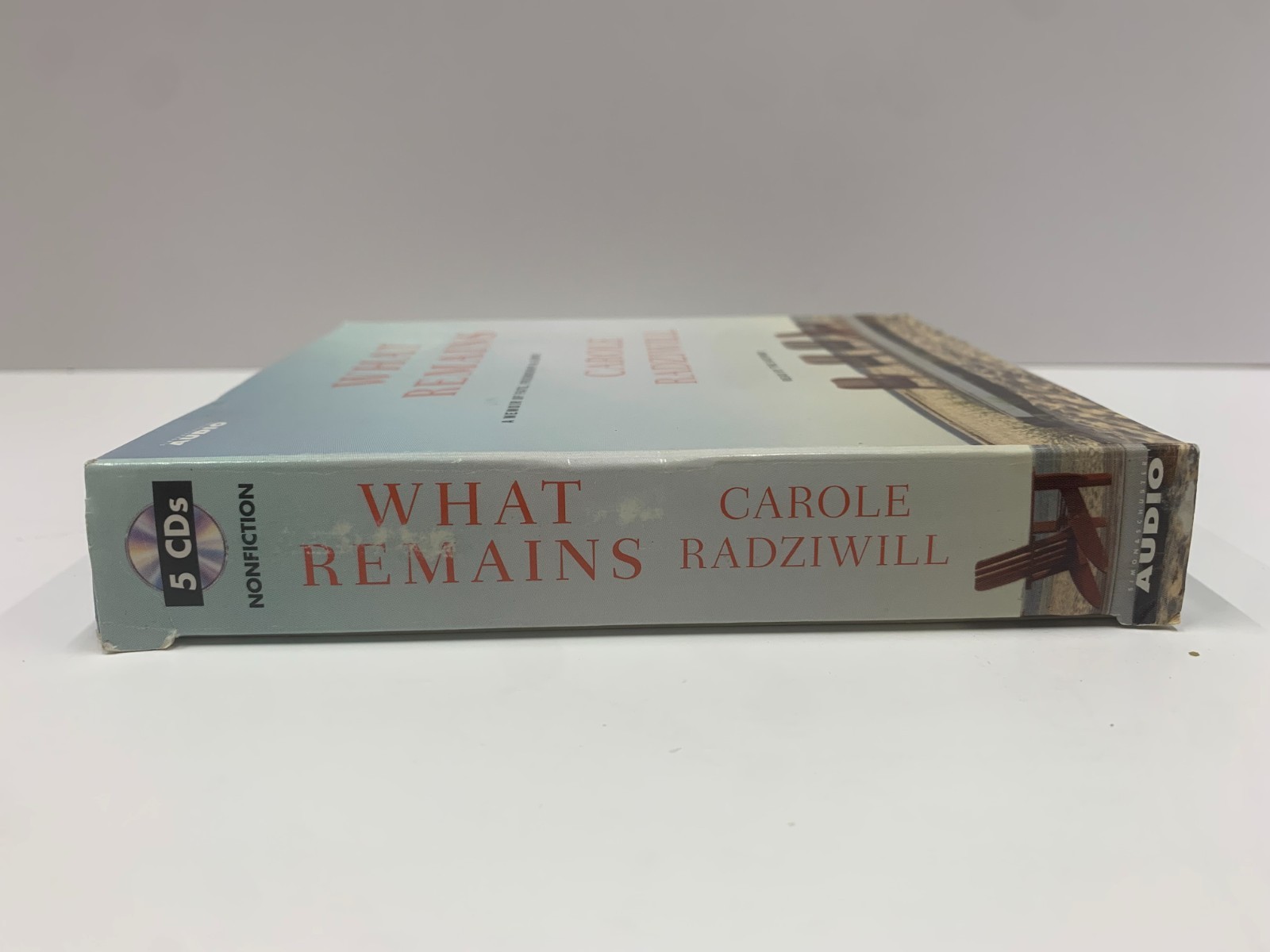 AUDIO BOOK-WHAT REMAINS. CAROLE RADZILL Free Shipping