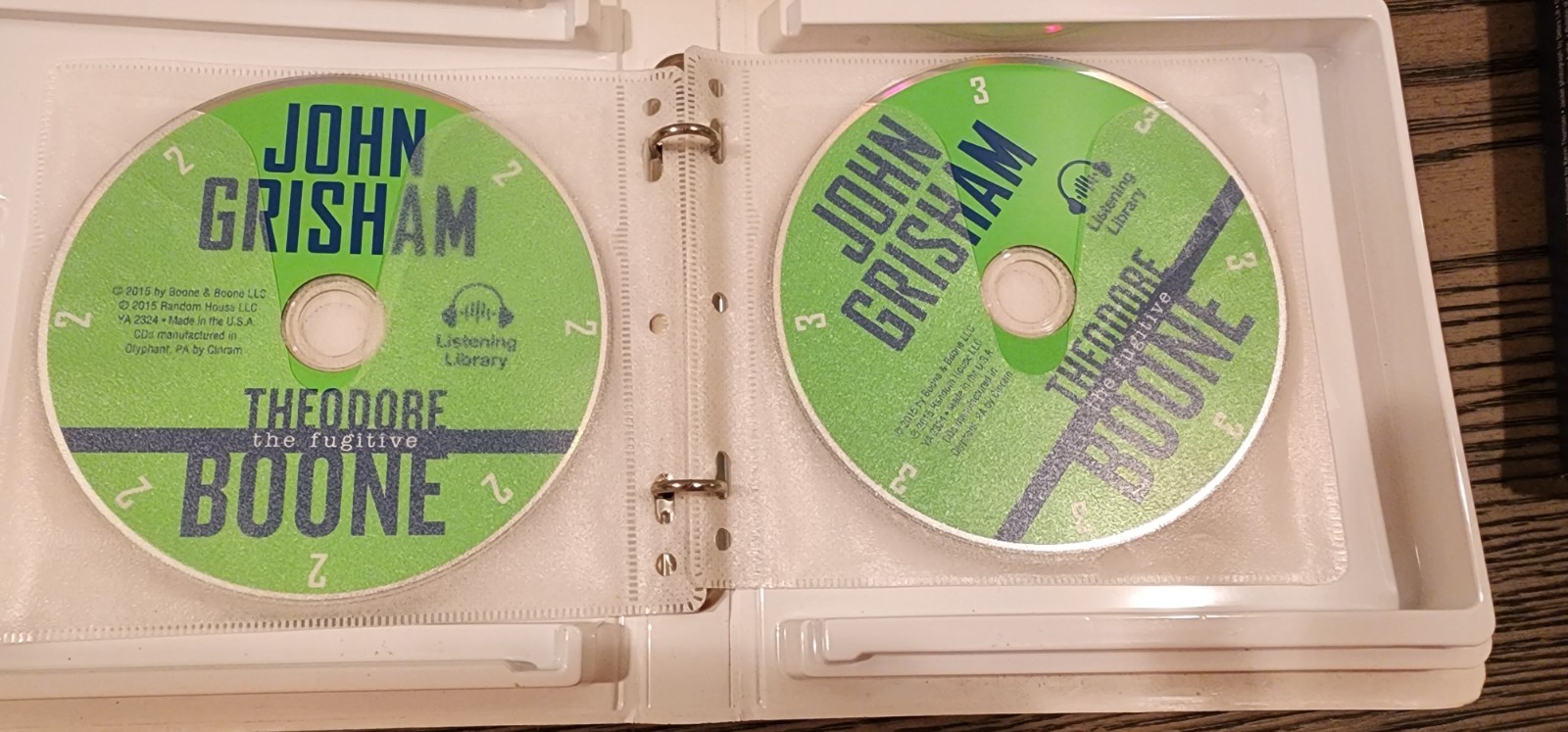 John Grisham 2 Audio Books CDs The Litigators & Theodore Boone Read