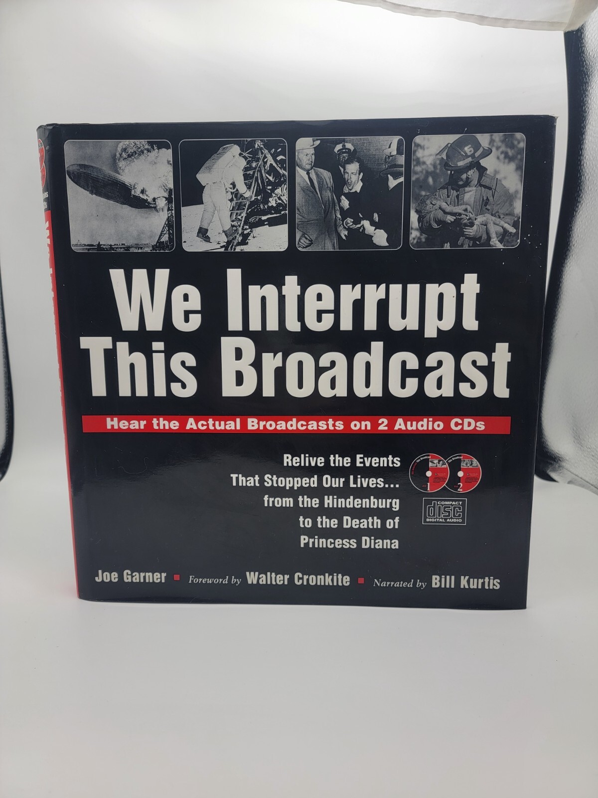 1999, We Interrupt This Broadcast Hard Cover Book (Includes 2 CD’s)