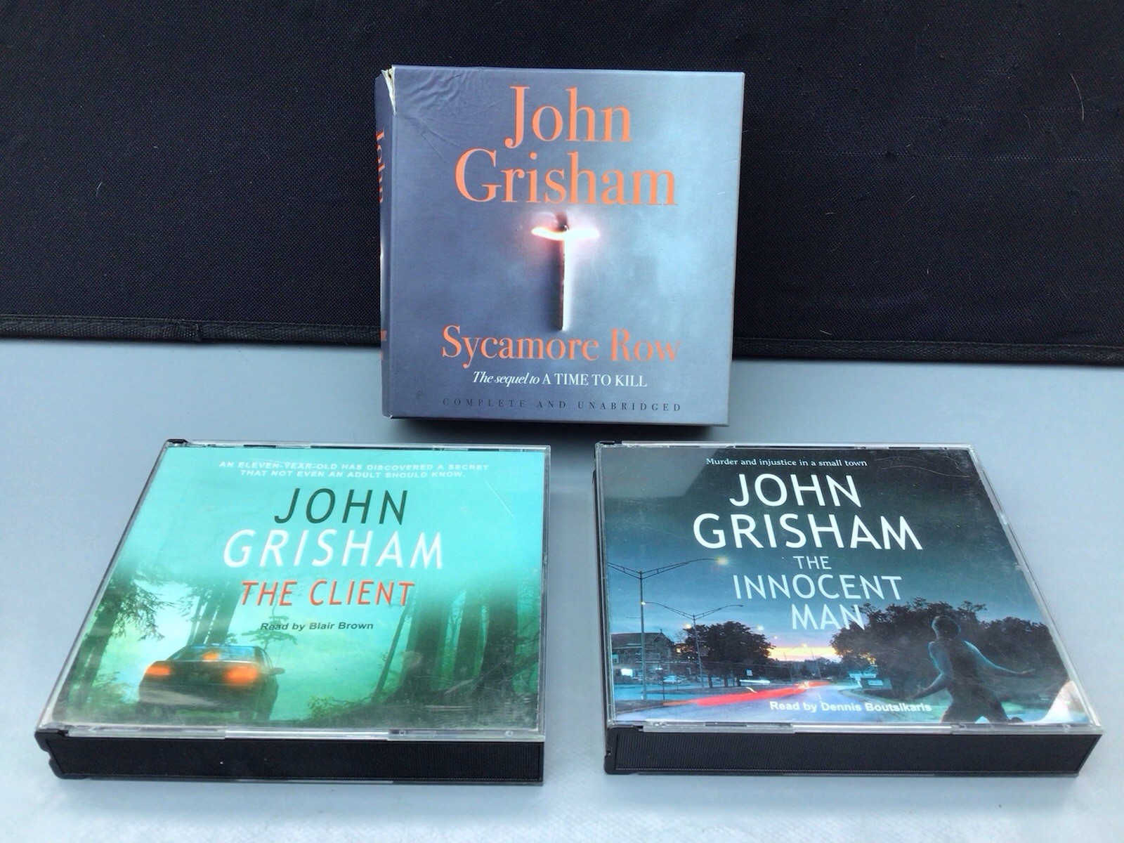 JOHN GRISHAM AUDIO CDs, SYCAMORE ROW, CLIENT + INNOCENT MAN