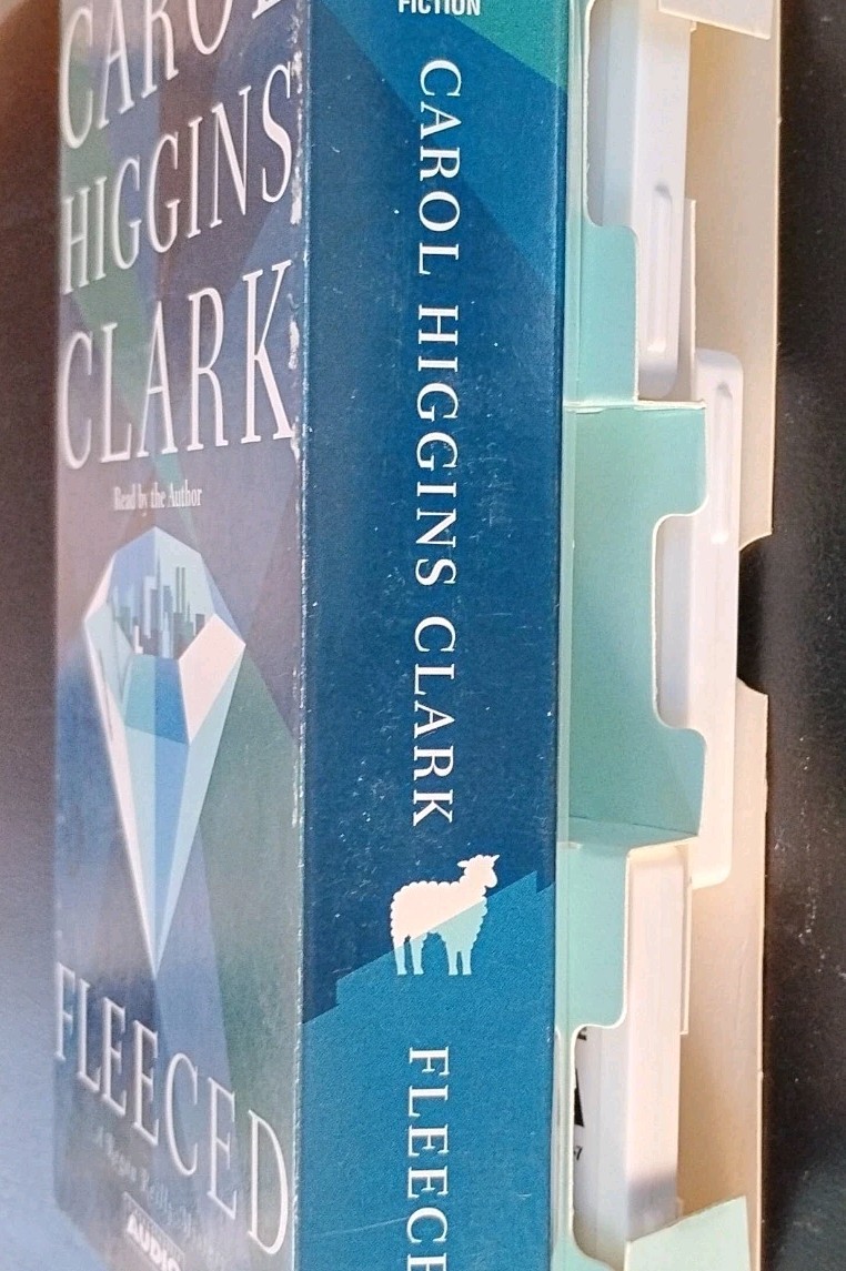 FLEECED A Regan Reilly Mystery Carol Higgins ClarkAudiobook On 3 Cassettes