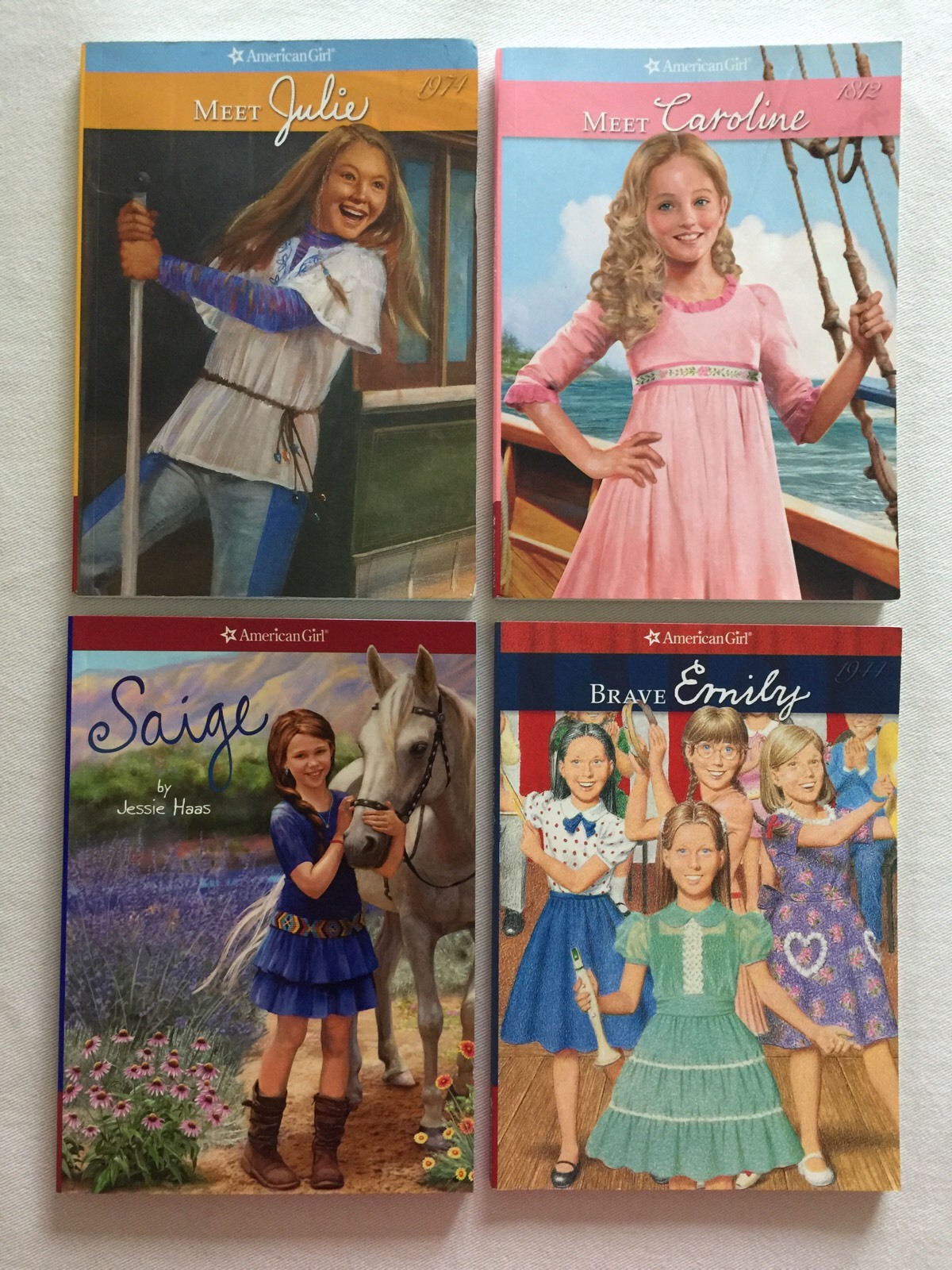 4 American Girl Book Lot Meet Julie Caroline Brave Emily Saige