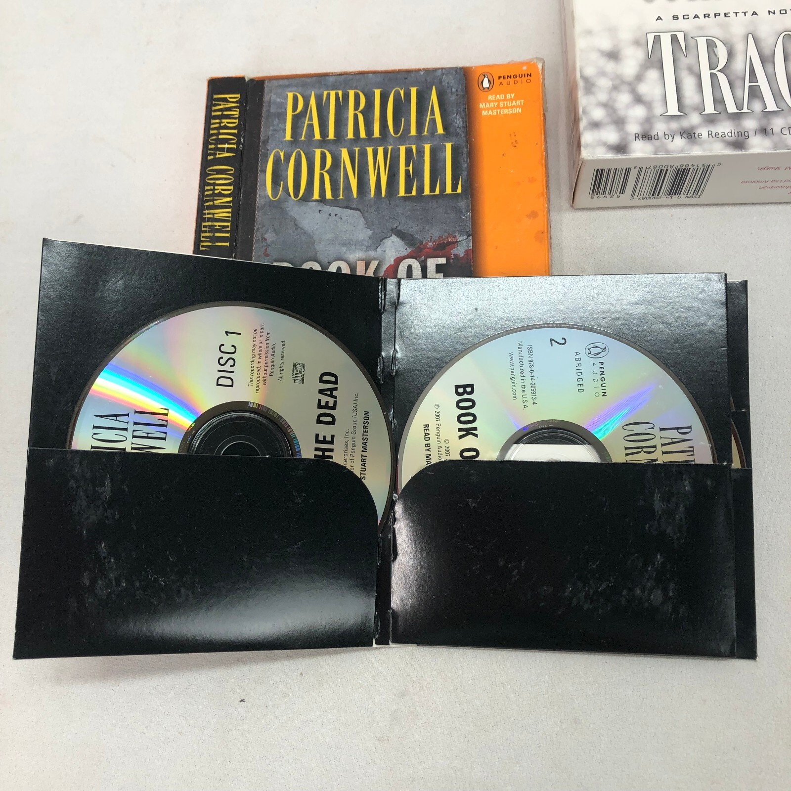 PATRICIA CORNWELL AUDIOBOOKS CDS TRACE 2004 & BOOK OF THE DEAD 2007 LOT OF 2